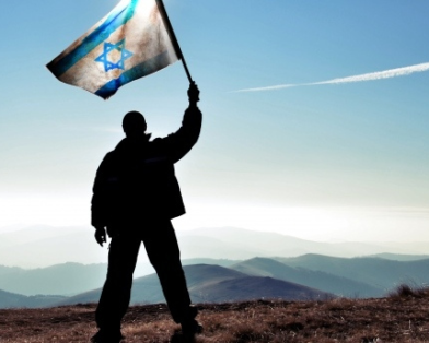 Man waves Israel flag